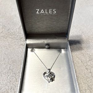 Zales 1/20 CT. T.W. Black & White Diamond "MOM" with Paw Print necklace